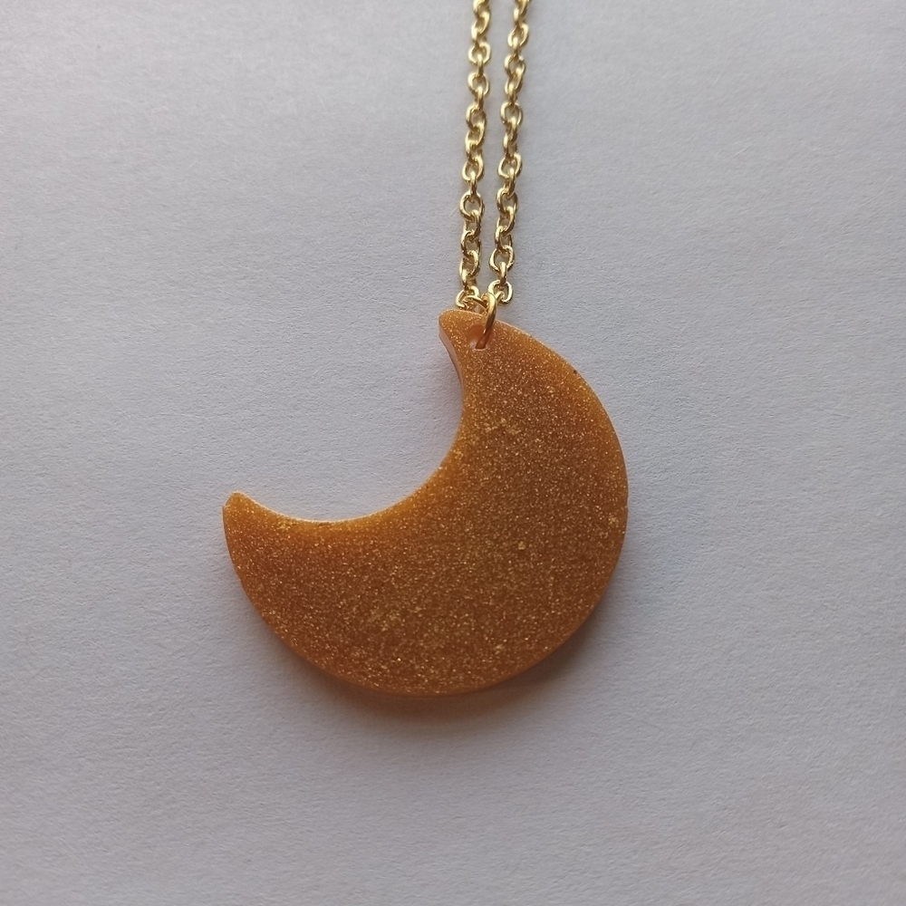5/$50 Orange resin moon necklace